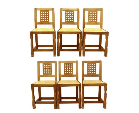 Workshop of Robert Mouseman Thompson (Kilburn): A Set of Six English Oak Lattice Back Dining Chairs, 1970s, cow hide seats, o