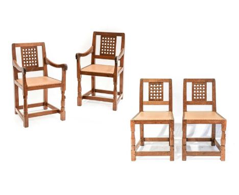 Workshop of Robert Mouseman Thompson (Kilburn): Four (2+2) English Oak Lattice Back Chairs, nail tan cow hide seats, on octag