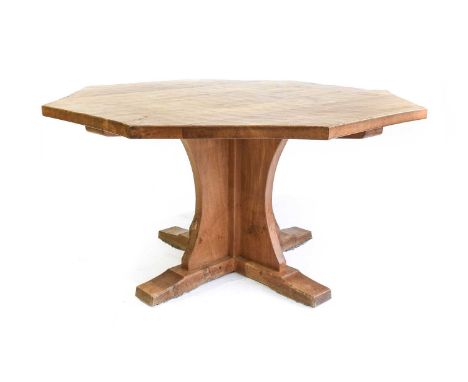 Workshop of Robert Mouseman Thompson (Kilburn): An English Oak Octagonal Dining Table, post 1971, adzed top, on a cruciform b