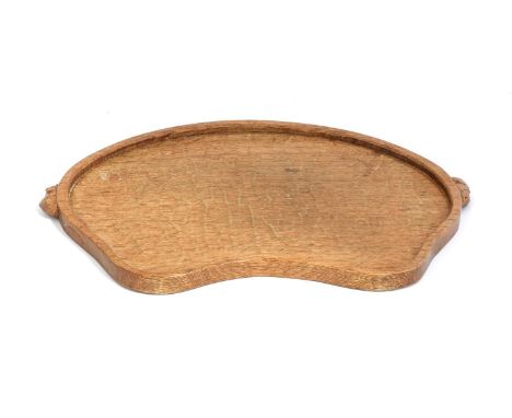 Workshop of Robert Mouseman Thompson (Kilburn): An English Oak Kidney Tea Tray, with carved mouse trademark handles, 48cm wid