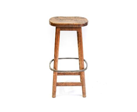 Workshop of Robert Mouseman Thompson (Kilburn): A Burr Oak Bar Stool, on four octagonal legs joined by rail, with wrought-iro