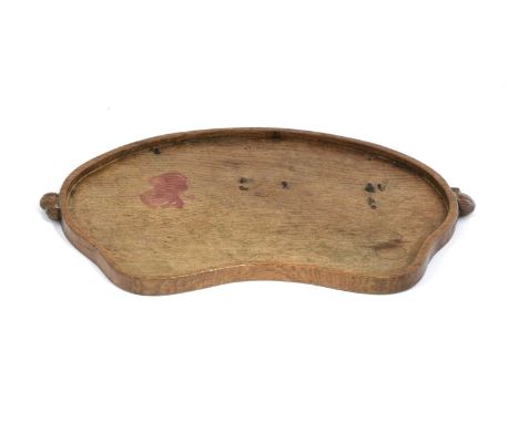 Workshop of Robert Mouseman Thompson (Kilburn): An English Oak Kidney Tea Tray, with carved mouse trademark handles, 48cm wid