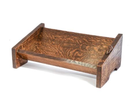 Robert Mouseman Thompson (1876-1955): An English Oak Book Trough, probably made for a church, with carved mouse trademark, 45