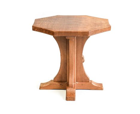 Workshop of Robert Mouseman Thompson (Kilburn): An English Oak Octagonal Coffee Table, adzed top, on a cruciform base, with c