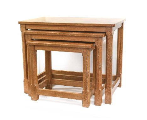 Workshop of Robert Mouseman Thompson (Kilburn): An English Oak Nest of Three Tables, adzed rectangular tops, on four octagona