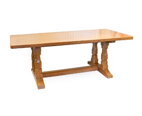 Workshop of Robert Mouseman Thompson (Kilburn): An English Oak 4ft Rectangular Coffee Table, on four octagonal legs joined by