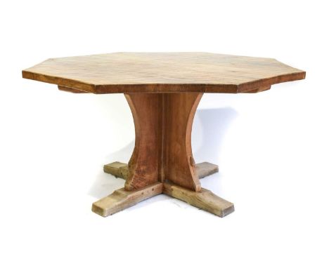 Workshop of Robert Mouseman Thompson (Kilburn): An English Oak Octagonal Dining Table, post 1971, adzed top, on a cruciform b