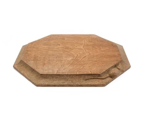 Workshop of Robert Mouseman Thompson (Kilburn): An English Oak Bread Board, of octagonal form, with carved mouse trademark, 3