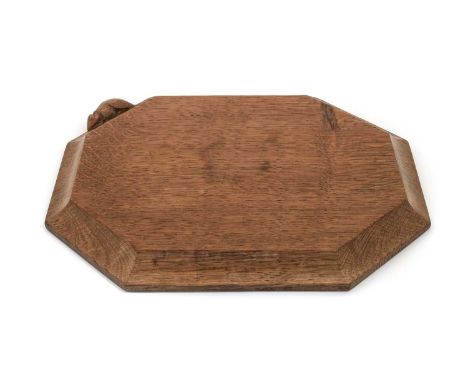 Workshop of Robert Mouseman Thompson (Kilburn): An English Oak Bread Board, of octagonal form, with carved mouse trademark, 3