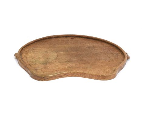 Workshop of Robert Mouseman Thompson (Kilburn): An English Oak Kidney Tea Tray, with carved mouse trademark handles, 46cm wid