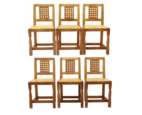 Workshop of Robert Mouseman Thompson (Kilburn): A Set of Six English Oak Lattice Back Dining Chairs, 1970s, cow hide seats, o