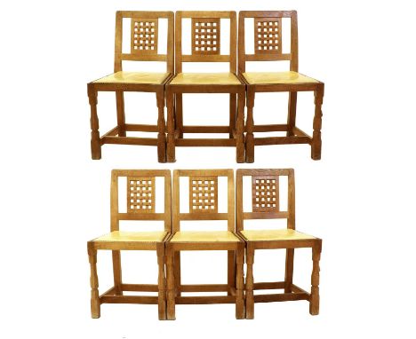 Workshop of Robert Mouseman Thompson (Kilburn): A Set of Six English Oak Lattice Back Dining Chairs, 1970s, cow hide seats, o