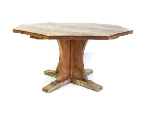 Workshop of Robert Mouseman Thompson (Kilburn): An English Oak Octagonal Dining Table, post 1971, adzed top, on a cruciform b