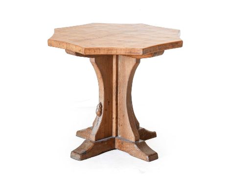 Workshop of Robert Mouseman Thompson (Kilburn): An English Oak Octagonal Coffee Table, adzed top, on a cruciform base, with c