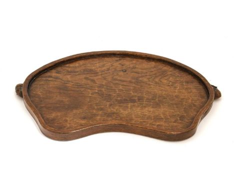 Workshop of Robert Mouseman Thompson (Kilburn): An English Oak Kidney Tea Tray, with carved mouse trademark handles, 48cm wid