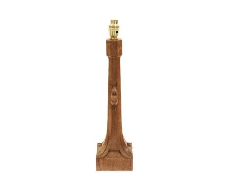 Workshop of Robert Mouseman Thompson (Kilburn): An English Oak Tall Table Lamp, octagonal column on a square base with carved