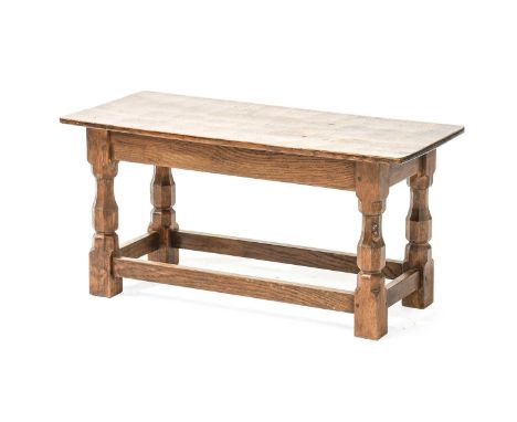 Workshop of Robert Mouseman Thompson (Kilburn): An English Oak Double Stool, with nailed top on four octagonal legs joined by