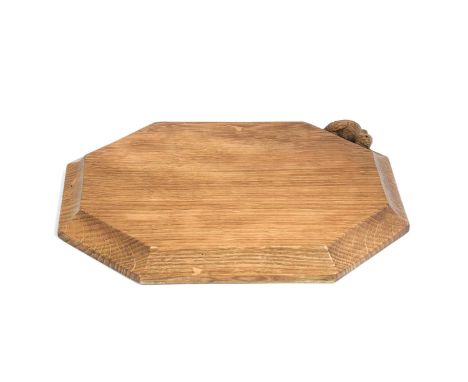 Workshop of Robert Mouseman Thompson (Kilburn): An English Oak Bread Board, of octagonal form, with carved mouse trademark, 3