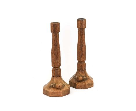 Robert Mouseman Thompson (1876-1955): A Pair of English Oak Candlesticks, made by George Cave (1893-1969) of octagonal form, 