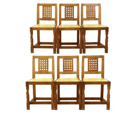 Workshop of Robert Mouseman Thompson (Kilburn): A Set of Six English Oak Lattice Back Dining Chairs, 1970s, cow hide seats, o