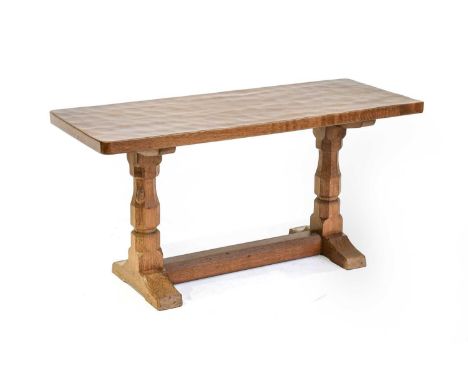 Workshop of Robert Mouseman Thompson (Kilburn): An English Oak 3ft Refectory Coffee Table, the rectangular adzed top on two o