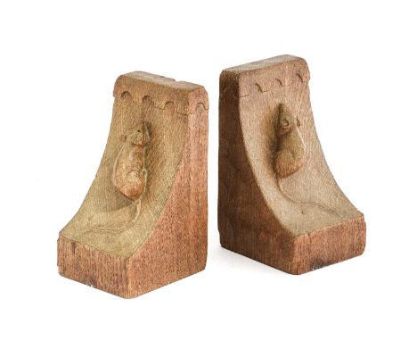 Robert Mouseman Thompson (1876-1955): A Pair of English Oak Single Mouse Bookends, 1950s, with penny moulded tops, each with 