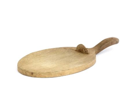 Robert Mouseman Thompson (1876-1955): An English Oak Cheese Board, of standard form, with carved mouse trademark on the board