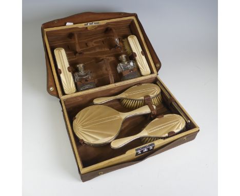 A cased George V silver and enamel lady's Vanity Set, by Collingwood &amp; Co., hallmarked London 1935, comprising hand mirro