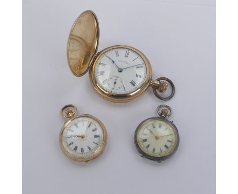 A 14k gold lady's Fob Watch, the white enamel dial with gilt decoration and Roman numerals, manual crown wind movement, metal