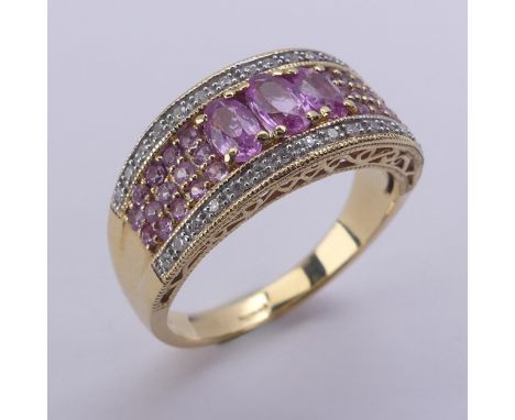 A QVC 18ct yellow gold, pink sapphire and diamond Dress Ring, Size O, 6g. 
