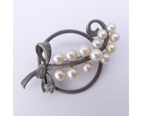 Mikimoto; A vintage silver and cultured pearl foliate spray Brooch, the reverse marked 'M S' (for Mikimoto and Sterling), 5cm