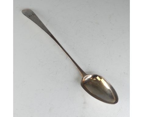 A George III Scottish silver Basting Spoon, hallmarked Edinburgh 1799, makers mark 'IL', Old English pattern with Celtic poin