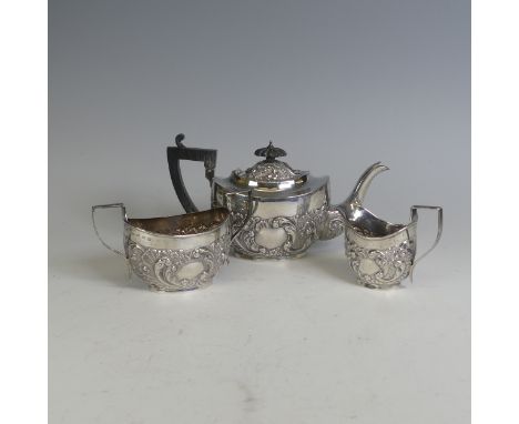 A late Victorian silver three piece bachelor's Tea Set, by&nbsp;Walker &amp; Hall, hallmarked Birmingham 1899, of ovoid form 
