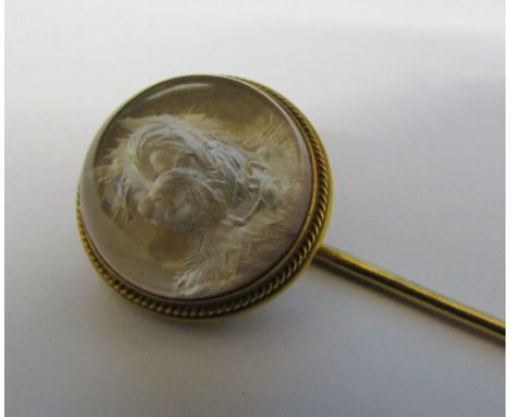 Tested as 9ct gold reverse crystal intaglio stick pin of a dog (not painted)