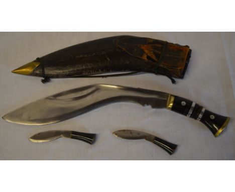 Napalese Kukri with blade stamped 'Military Supply Syndicate' with scabbard and two miniature sharpening blades