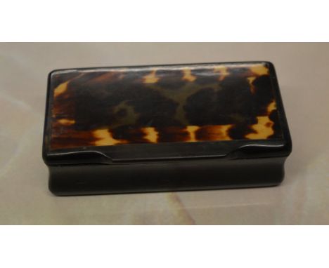A small synthetic tortoiseshell topped trinket / snuff box, approx 9cm wide