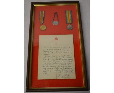 Framed WWI Victory & British War Medal attributed to '203003 Pte H A Yendell, E Kent R' along with a single dog tag / ID brac