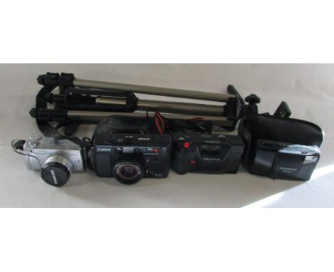 Various cameras - Canon AF35M, Olympus Camedia C-7657 Ultra Zoom, Pentax PC35AF-M, Olympus Trip 301 and a tripod