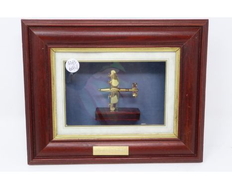 Framed metal Lancaster bomber om a wooden plinth, overall 21 x 26 cm. P&amp;P Group 1 (£14+VAT for the first lot and £1+VAT f