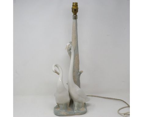 Nao figural group table lamp with two geese, H: 52 cm. All electrical items in this lot have been PAT tested for safety and h