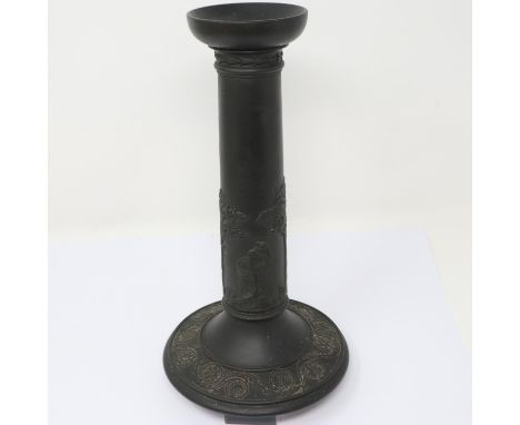 Wedgwood black basalt candlestick, H: 24 cm, signs of age throughout. P&amp;P Group 2 (£18+VAT for the first lot and £3+VAT f