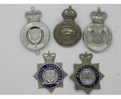 Five UK police cap badges: Cheshire Constabulary (x2), Metropolitan Police, Oxfordshire Special Constable and North Wales Pol