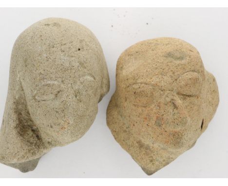 Two ancient cast ceramic heads, H: 55 mm. P&amp;P Group 1 (£14+VAT for the first lot and £1+VAT for subsequent lots) 