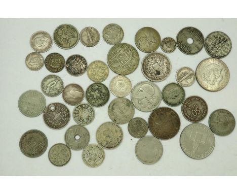 A collection of UK Commonwealth, USA and other world silver coins, including 1964 Kennedy half dollar, 1934 New Zealand sixpe