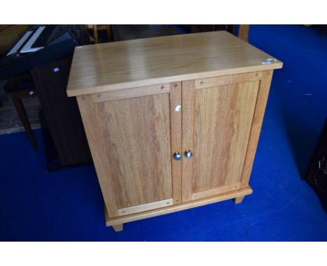 A modern light oak TV cabinet/desk unit, approx dimensions W69cm D52cm H85cm