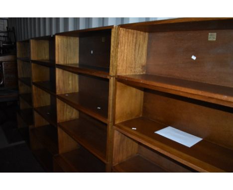 A run of four vintage Simplex stacking bookshelves, each having four tiers over deep base, width of each unit approx. 91cm