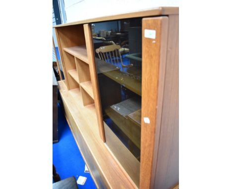 A vintage teak sideboard with part glazed top section