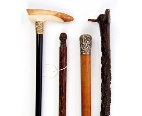 Regency partridge wood dandy cane with carved human skull knop, Victorian ivory tusk-handled walking stick, Chinese silver mo