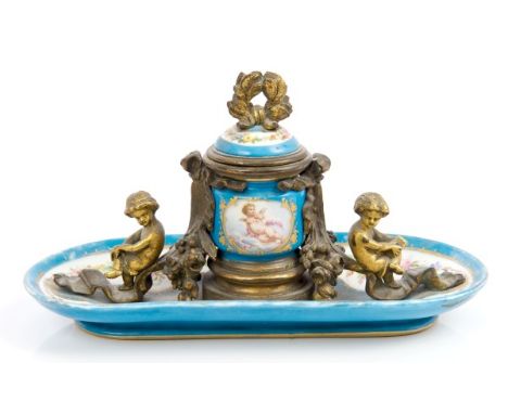 Late 19th century gilt metal mounted Sèvres-style desk stand with central inkwell with wreath finial flanked by ribbon scroll