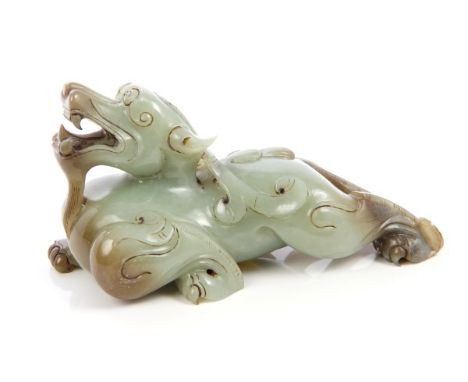 Chinese carved jade figure of a recumbent dragon, 11cm long